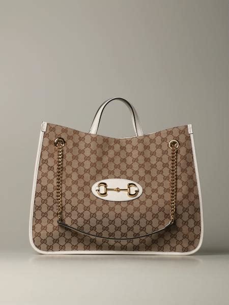 gucci c63|white gucci shopping bag.